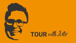 Image of arto´s face as logo on an orange background with the text "tour with Arto" 